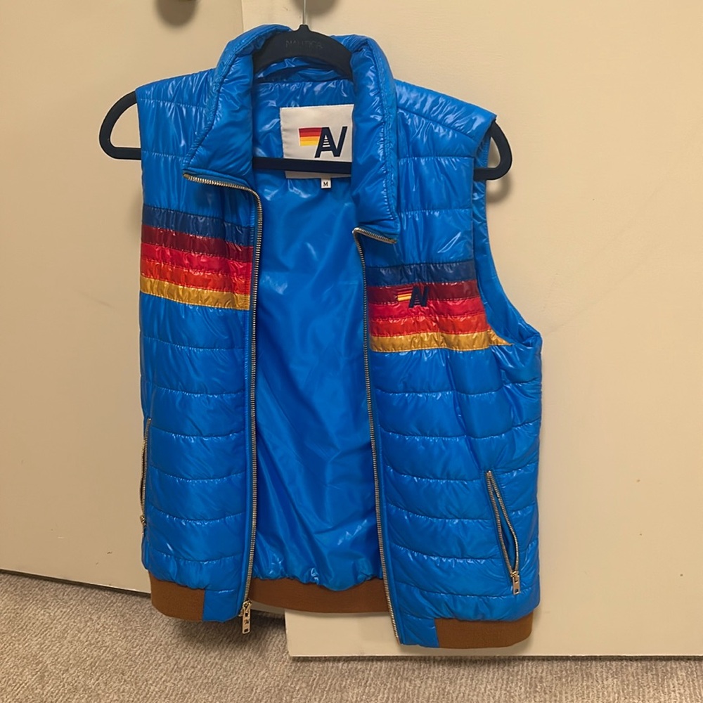 Women’s medium blue with stripes aviator nation vest